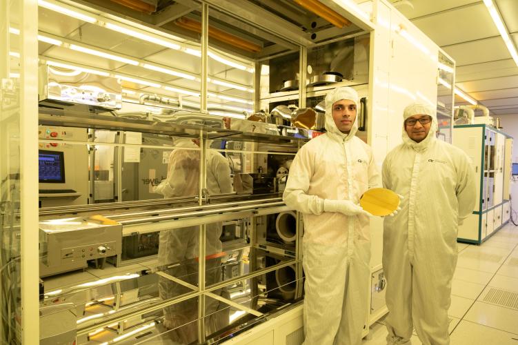 Researchers in clean room