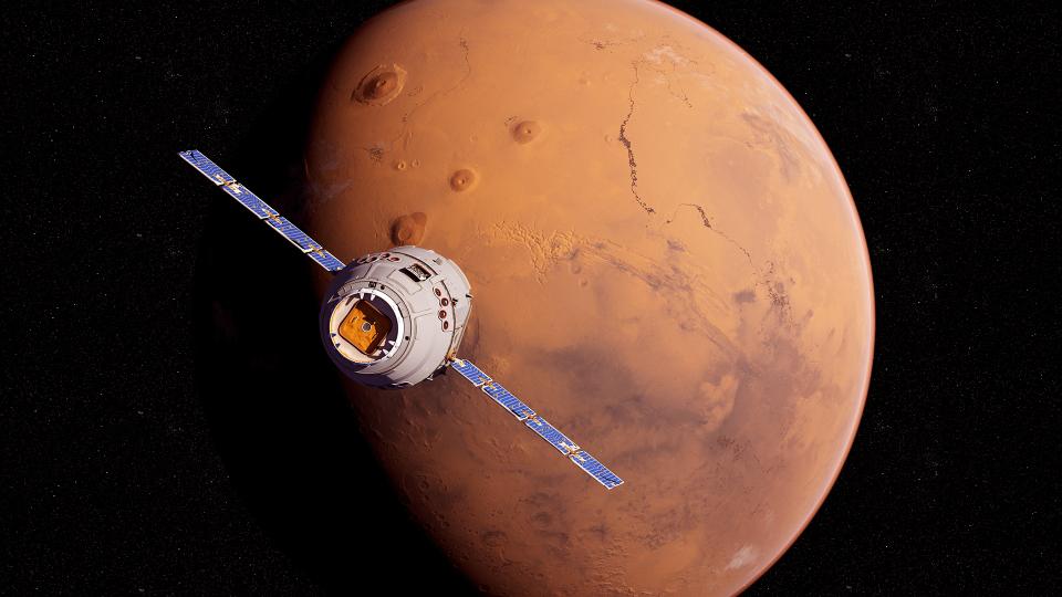 the planet mars with a satellite flying in front of it