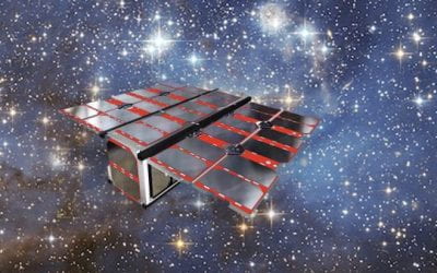 A small satellite with extended solar panels flying against a star-filled space background.